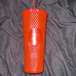 Pink studded Starbucks cup